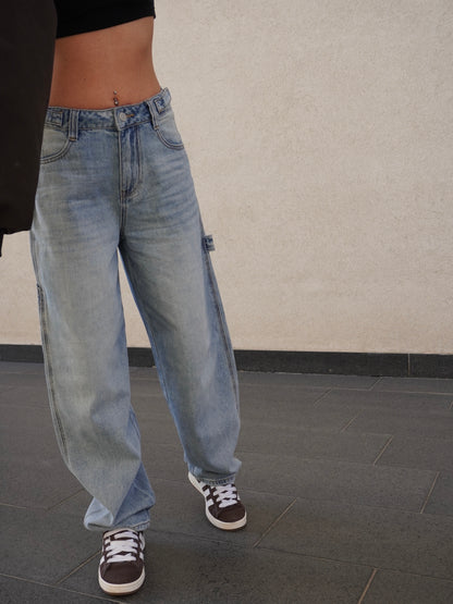 JEANS BAGGY CON FIBBIE