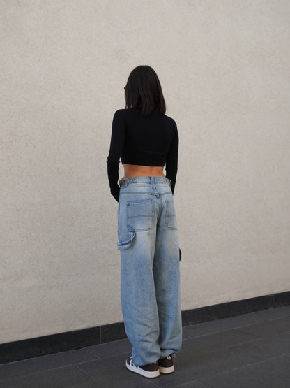 JEANS BAGGY CON FIBBIE